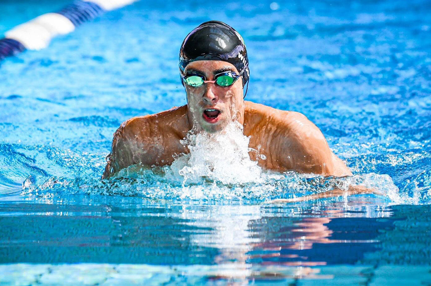 Max Wilson swims